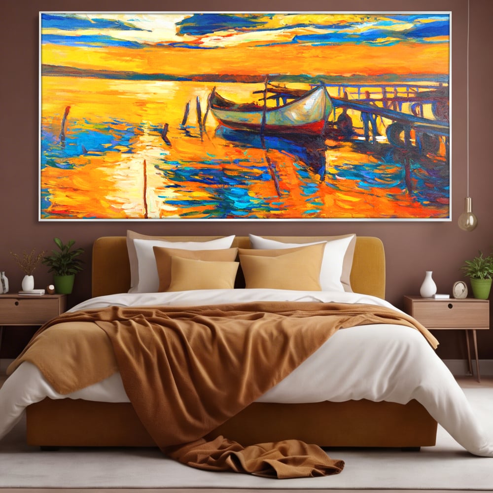 Tablou canvas cu pictura cu barca la apus, in rama de aluminiu argintiu, pe perete intr-un dormitor